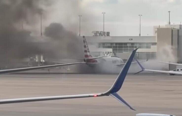 American Airlines plane engine catches fire at Denver airport