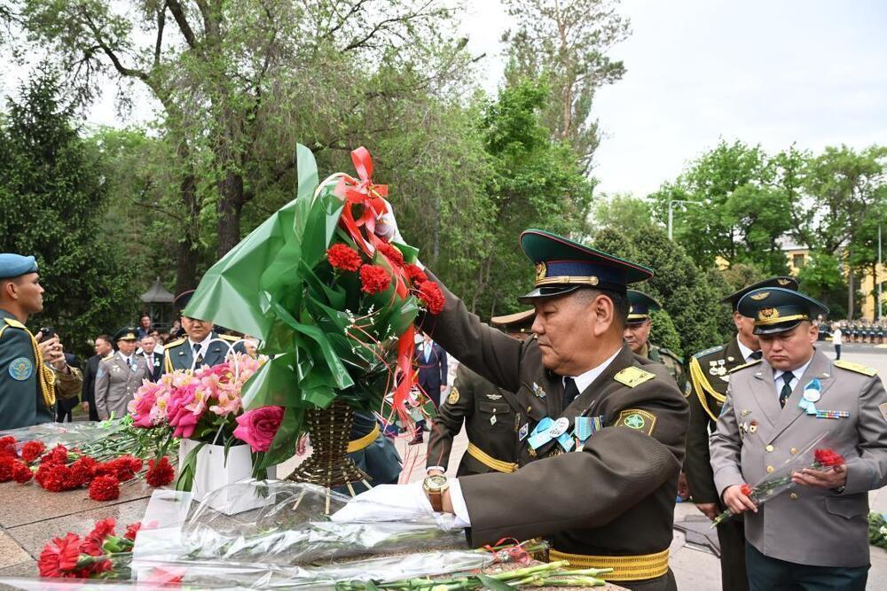 People Gather at the Eternal Flame to Honor WWII Heroes. Images | gov.kz